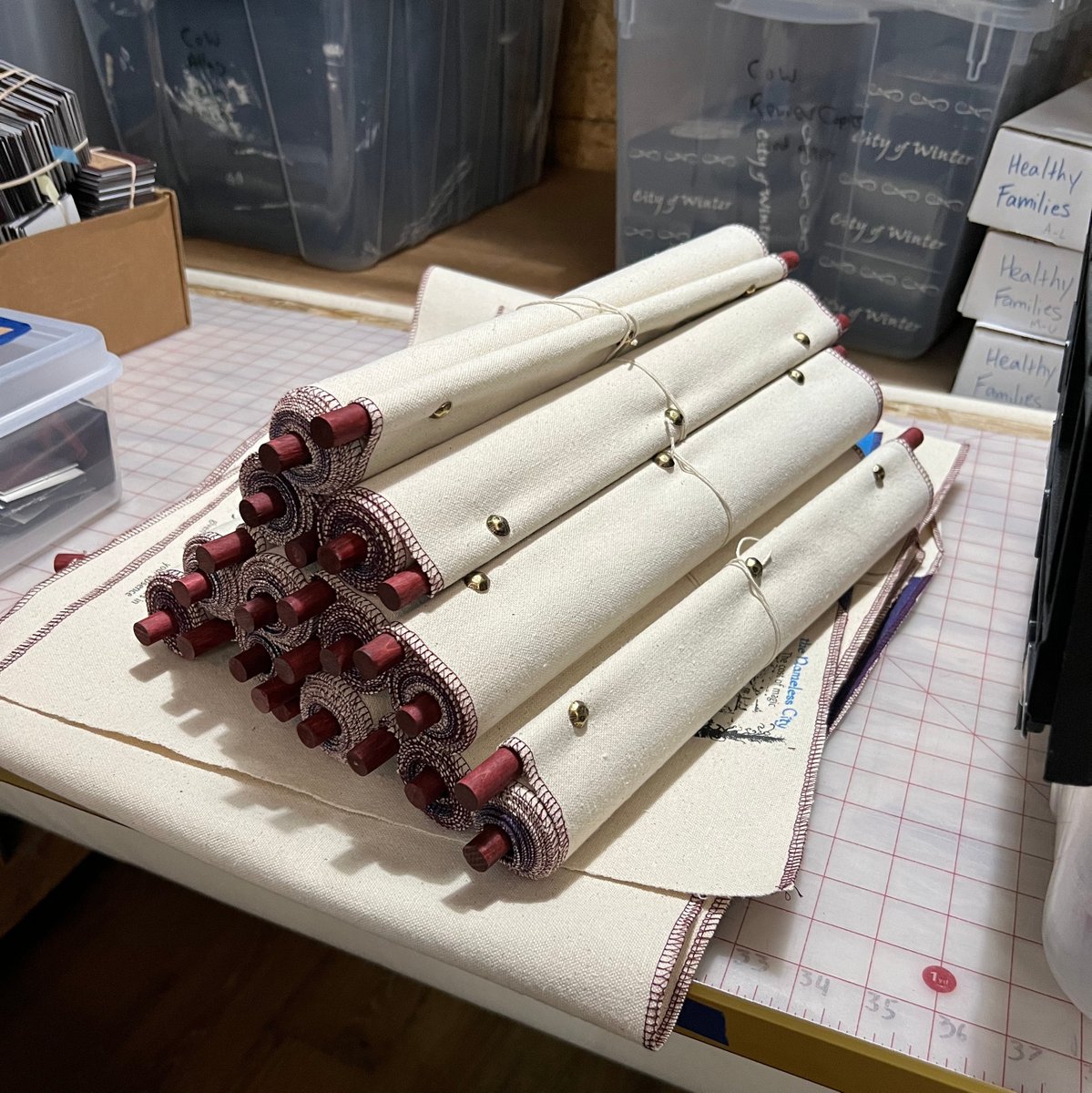 hotdeernicorn's tweet photo. Scrolls for Fall of Magic, each one printed, sewn, and assembled by hand #fallofmagic https://t.co/kPOZYC3zPF