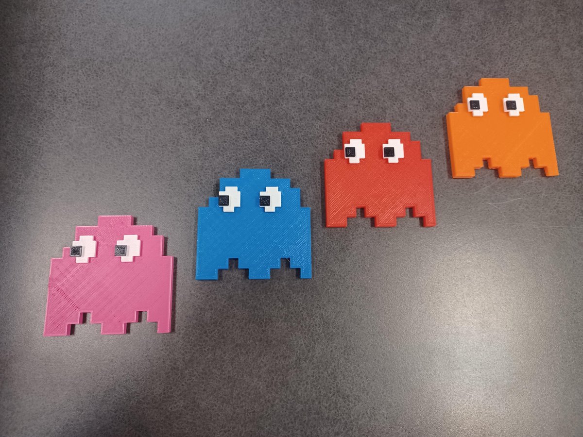 3d printed Inky, Blinky, Pinky, and Clyde. Made by Isaac and Maria.