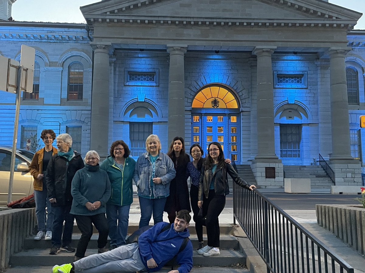 quovclub's tweet photo. On #WorldOvarianCancerDay we gathered with community members and ovarian cancer survivors to watch City Hall light up teal to honor this day.  We’re excited to start planning the Walk of Hope in Kingston together this summer! https://t.co/ABrpT3LYhg