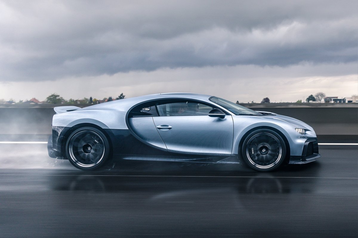 Bugatti's tweet photo. A moment in time that will live on forever: the most valuable new car ever sold at auction – the CHIRON Profilée – is united with its owner, who personally collected the only existing example at the home of BUGATTI in Molsheim.

#BUGATTI #CHIRONProfilee
–
https://t.co/mCEE0ghyaw https://t.co/sIGl0QqiM3