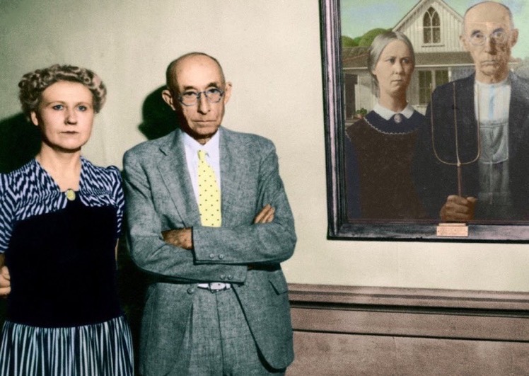 PHOTO OF THE DAY: The two people used in American Gothic by Grant Wood stand next to the iconic painting. They were Wood’s sister Nan Graham and his dentist Dr. Byron McKeeby (1942). 📷 Cedar Rapids Museum of Art Archives.
