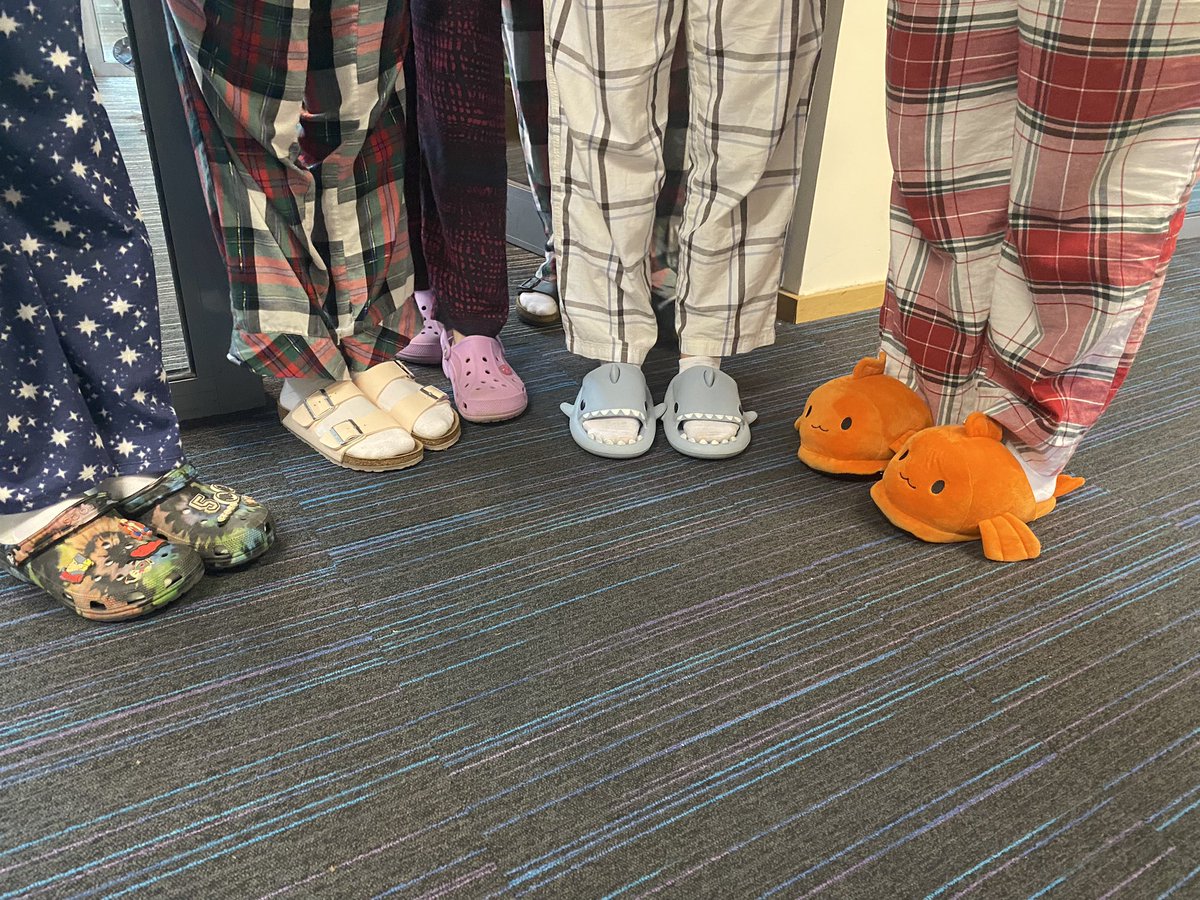 T-4. Pyjama day! Accompanied by some natty footwear.