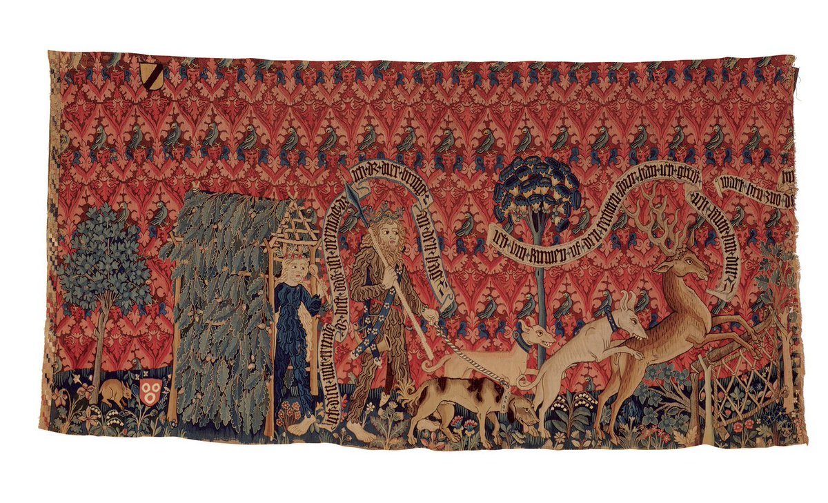 CariGluchowski's tweet photo. This colourful #medieval tapestry (@HistMuseumBs, Inv. 1981.88.) depicts 'Wildmen on a Stage Hunt'. It was made for the marriage of Hans von Flachslanden, mayor of #Basle (1454-1463), to Barbara von Breitenlandenberg. https://t.co/lRNaJVI67c #medievaltwitter #medievalart https://t.co/5DVcV97tSv
