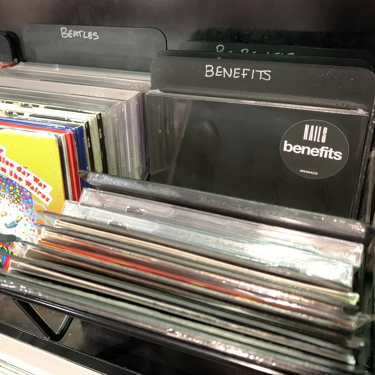 Benefitstheband's tweet photo. It’s an absolute buzz to see our album in @hmvMiddlesbro (@hmvtweets). There’s something really wholesome about buying our own record (for my my mum) in the same shop where I’ve bought so many brilliant albums over the years. Makes it all feel very real, an achievement 💪. https://t.co/6WzfvPqE1K