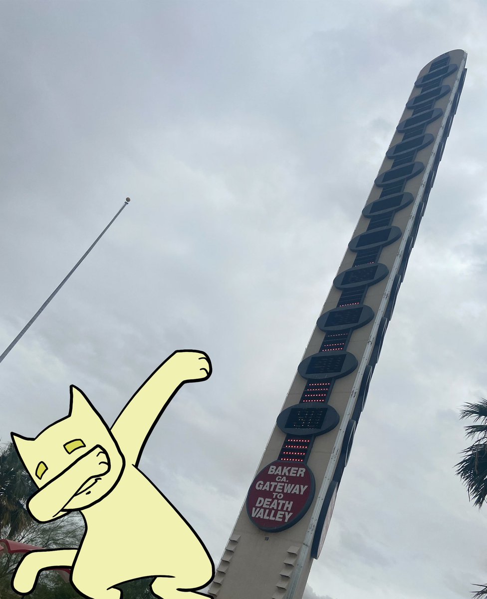Toad_the_Cat's tweet photo. On the way back from Vegas last week, I stopped in a little town called Baker.  I took the opportunity of posing next to the World’s Tallest Thermometer. Wouldn’t want this stuck in my butt.  #CatsOfTwitter #comics https://t.co/63zXSYRu1V