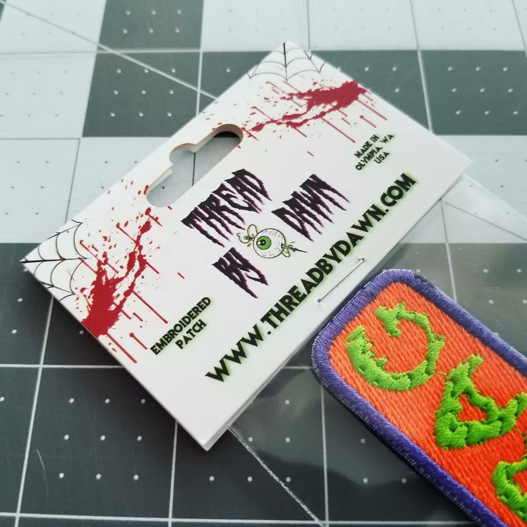 ThreadByDawn's tweet image. The new retail packaging is lookin&apos; pretty cool 😎

Recycled cardstock and biodegradable PLA.

#patchshop #patchmaker #patchesandpins #embroideredpatches #ecofriendly