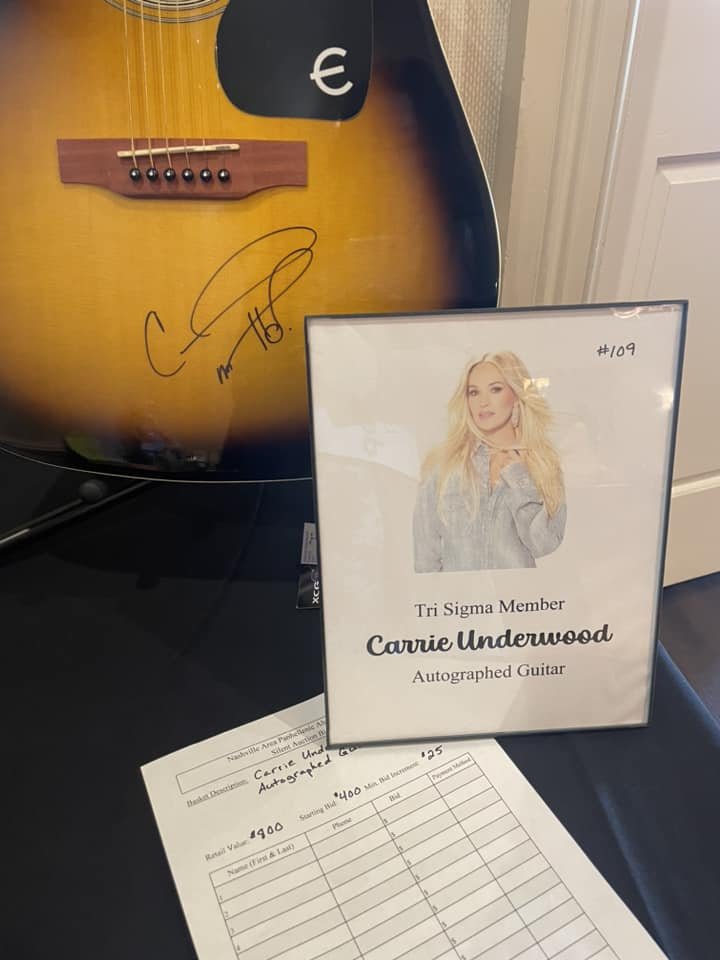 Thank you <a href="/carrieunderwood/">Carrie Underwood</a>, Alpha Iota–Northeastern State University, for donating an autographed guitar to the Nashville Area Panhellenic Alumnae Association's annual Scholarship Luncheon!

Proceeds from the auction go toward providing scholarships to local high school students.