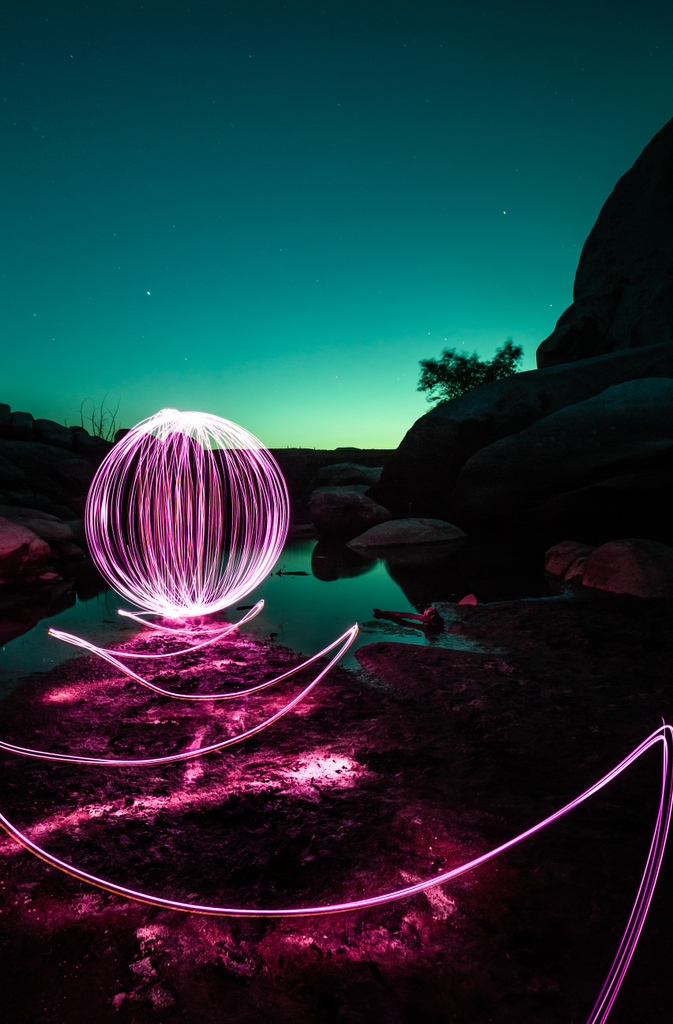 MackMurdoc's tweet photo. "Light painters create art on a canvas of darkness. Each stroke of light is a deliberate choice, a conscious decision to add to the composition. The canvas is unforgiving, every mistake is permanent, and there is no way to undo what has been done. 
#philosophy  #lightpainting https://t.co/jmWgf0XSZn