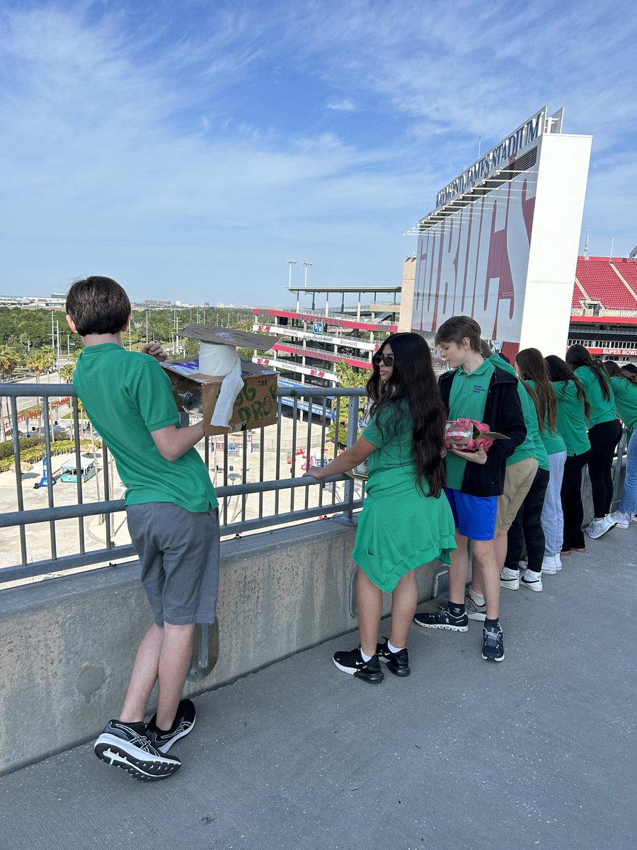 CorbettPrep's tweet photo. At the top of the stairs at Raymond James Stadium to see if eighth graders can build structures to protect an egg from the fall! #corbettprep #eggdrop https://t.co/fqcPmRnRGC