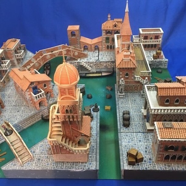 Trae la belleza, el romance y la acción de Venecia a tu mesa de juego con Water Spire, Esta campaña de Kickstarter te permite recrear los famosos canales y la arquitectura de la ciudad de forma totalmente modular y personalizable, con edificios espectacu… instagr.am/p/CsCV1WIp_Hc/