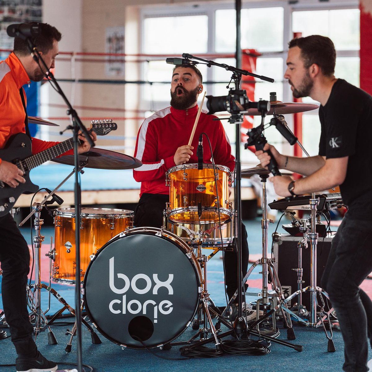 DropdownMediaIE's tweet photo. #tbt Here’s some BTS of when we shot the @box_clone “My Way” one-take music video at the @corkthaiboxing club!

📷 @mimilanevocalist Swapping roles and testing out our Sony 70-200GMII 📸

#BehindTheSecenes #MusicVideo #VideoProduction #Cinematography #Filmmaking #sonyalpha https://t.co/IAv5VjhSLL