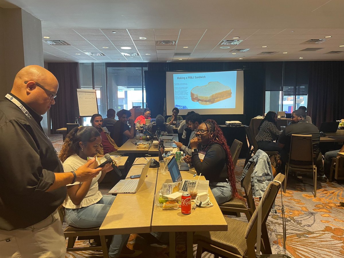 Internet2's tweet image. Great energy in the Student Hackathon today in Atlanta at #CommEX23 - thanks to @omnibond for donating computing resources and trainers Charlie Dey and Je’Amir Powell from TACC