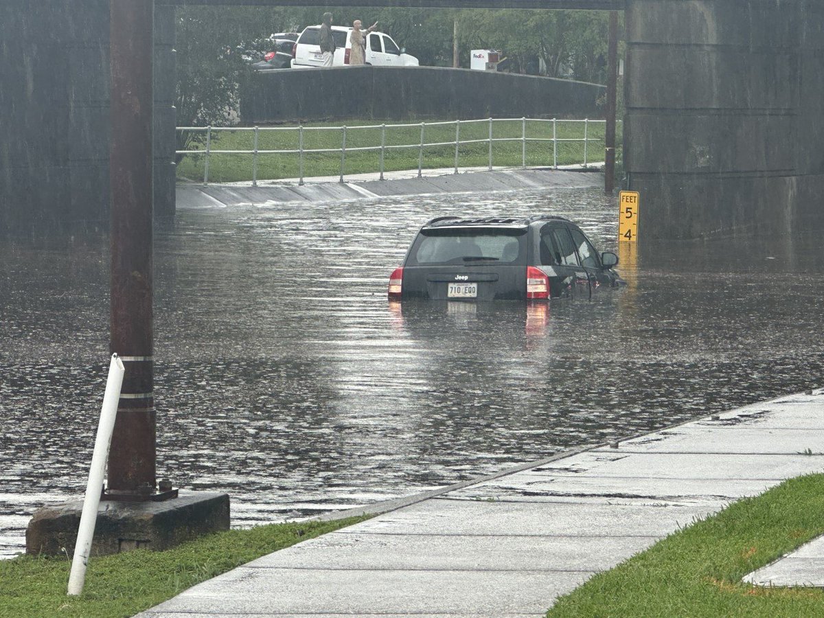 TURN AROUND, DON'T DROWN: This photo was taken at Canal Boulevard and Homedale Street, right off the Pontchartrain Expressway at Metairie Road. We're told at least one person has been rescued from the water, last seen growing to four feet as the rain persisted.