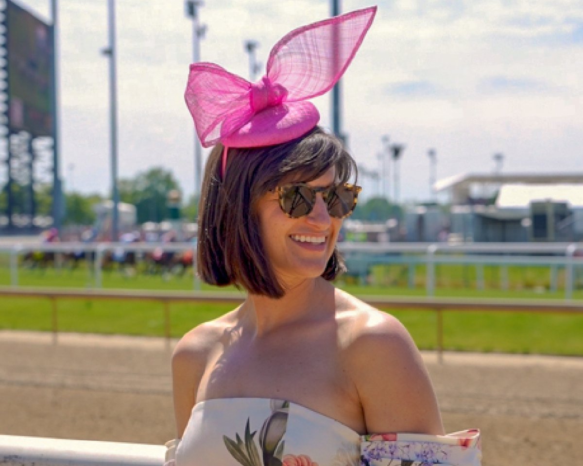 Ford's tweet photo. At the Kentucky Derby, FORD fans made a run for the roses, showing their Derby outfits. With fun FORD activations throughout the Churchill Downs grounds, including the Charge Bar powered by the FORD F-150 Lightning® – it was an unforgettable Day at the Races. #FordxKentuckyDerby https://t.co/Sn3vXQTzR6
