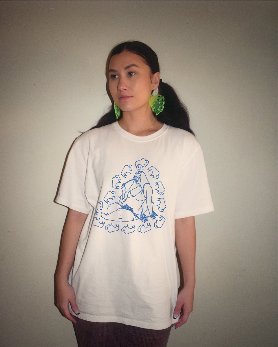 t-shirt PRE-SALE LIVE! shynatives.com/collections/t-…  

Aly McKnight x <a href="/shynatives/">Shy Natives</a> 🦬🪻💙 50% proceeds go to Changing Woman Initiative ❤️ we are offering $5 bucks off for our pre-order period!!!! #shynatives #alymcknightart #changingwomaninitiative #indigenous #nativemade #nonprofit