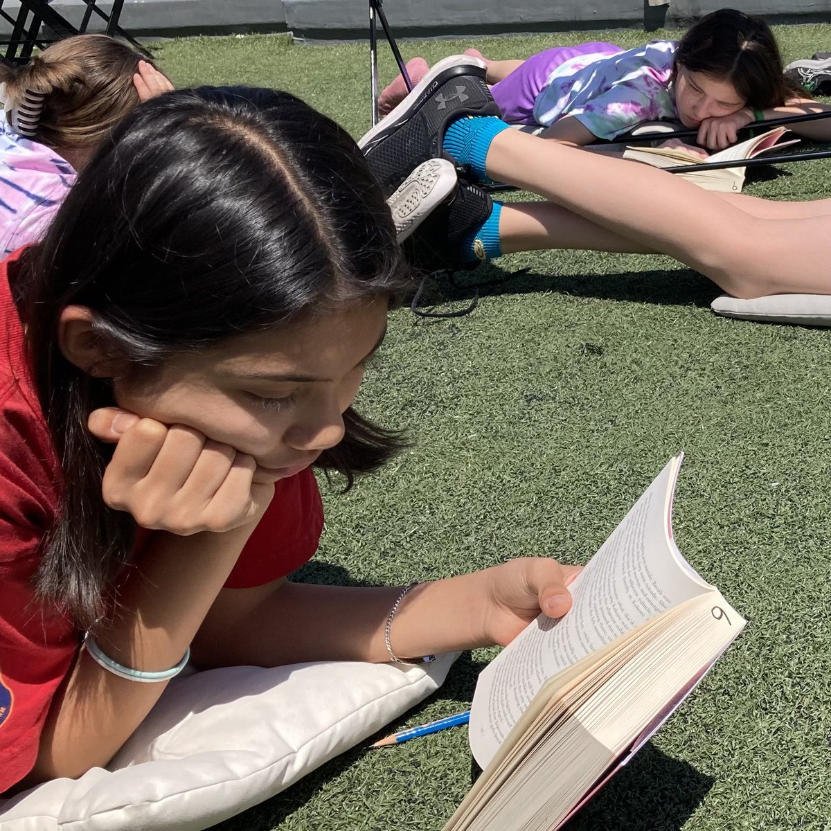 MSTmiddleschool's tweet photo. #MSTEucalyptus students enjoying the sunshine and devouring the first chapter of Mizuki Tsujimura’s novel Lonely Castle in the Mirror #WeAreMST #MSTimagination #montessori https://t.co/CBawToe2sQ