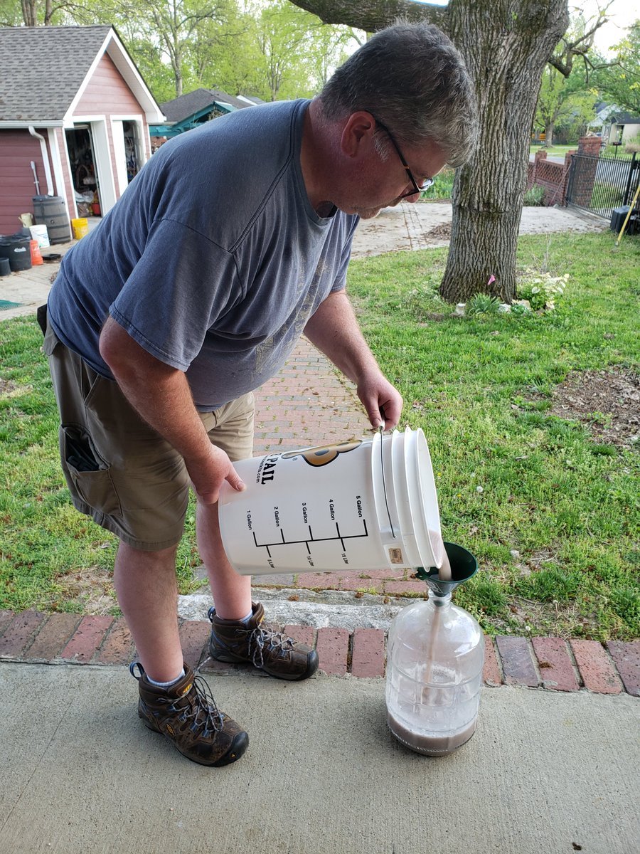 EngineerdSpirit's tweet photo. Now that the yeast is added, James Moore pours off his #JimmyRedcorn beer to let it ferment. Over the next few days we’ll keep a close eye on it. Once it stops perking, we’ll know it’s time to take it out and sample it. It was at 7% alcohol going in, but what will it come out as? https://t.co/6dOfUfu9E5