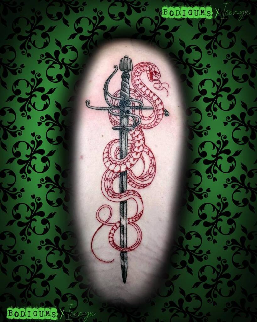 iconyxtattoo's tweet photo. Snake + sword back piece 🐍 🗡️- from Bodi this week. Classic 👏 
.
.
@bodigums
.
.
#tattoo #tattooing #kent #sittingbourne #TattooInspiration #tattoos #inked #tattooed #tattooink #kenttattoo #gothtattoo #tattoowork #ink #gothic #snaketattoo #swordtattoo #redink #tattooart #tat… https://t.co/BRVyNkMrkw