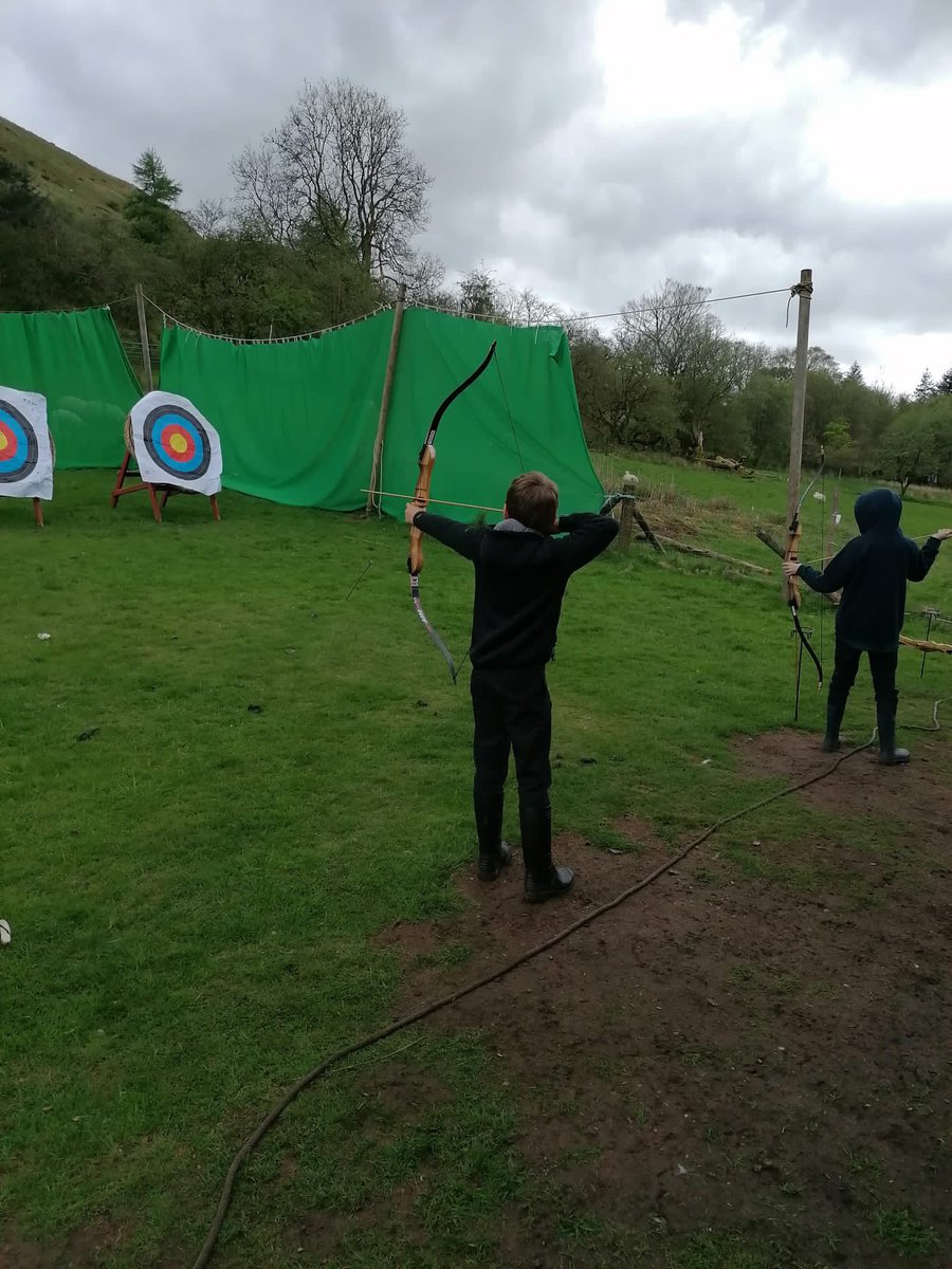 We’ve been improving our firelighting skills, toasting marshmallows and practicing our archery skills #greatteamwork @PODolygaer