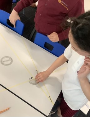 DTPartington's tweet photo. In Maths, Year 5 have been using protractors to measure angles. #handsonlearning #maths https://t.co/CTPs48JSko