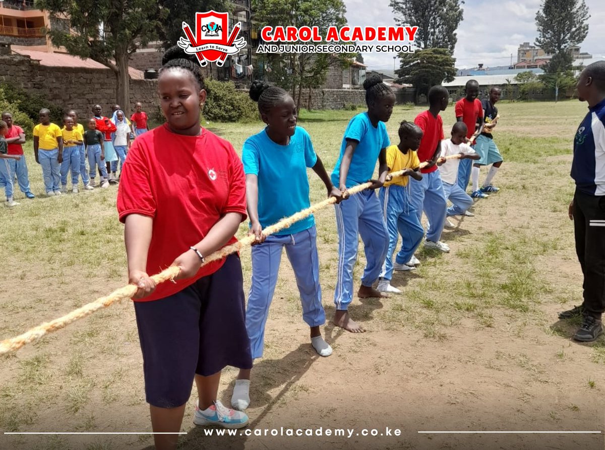 Our kids are not only learning to work together but also having a blast while doing it! A game of tug of war is just one of the many fun activities our children enjoy.