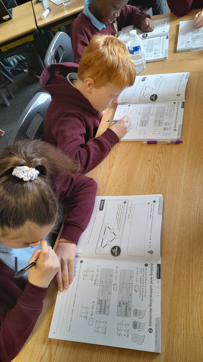 RhodesGreenCE's tweet photo. Lots of hard work this morning in YEAR 5 adding and subtracting decimals #LHmaths https://t.co/FAcMJL4GET