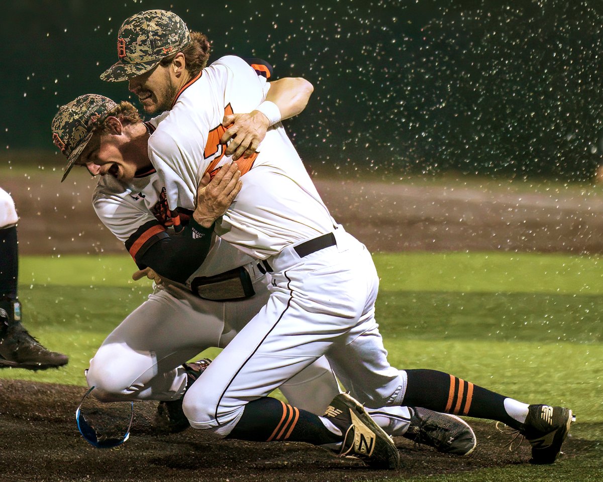 DoaneAthletics's tweet photo. How about one more photo from last night, and no it wasn't raining - that is the water bottles being splashed following the final out!

📸 @meyerben_photo always capturing a great pic for us! https://t.co/MpvZVRoH8L