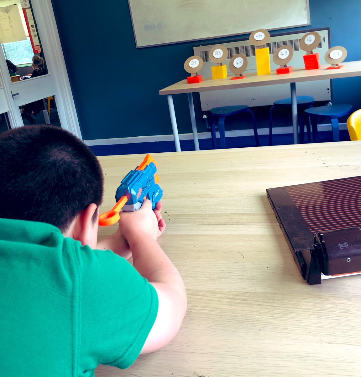 Ver_WPA's tweet image. Who said times tables are boring?! Ready, aim and solve the calculation! Today’s focus was the 7 times table #WatersideMaths #happychildrenlearn