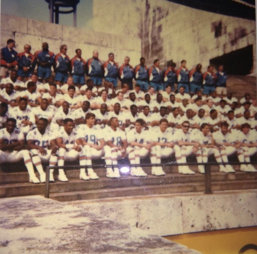 perfctszn's tweet photo. Here’s a picture of our Miami Dolphins team in Germany - August 1992.

They went on to beat the Denver Broncos 31-27… This matchup featured both Dan Marino &amp; John Elway. 👀 #Finsup https://t.co/qyEokxk05Q