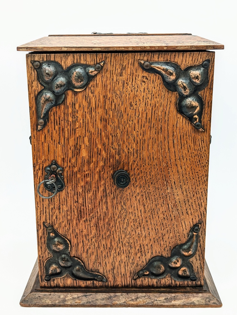 BeestonAuctions's tweet photo. Lot 1313: Early 20th Century Oak Smokers Cabinet with Arts &amp; Crafts Copper Panels. Available tomorrow in our Jewellery, Silver, Antiques &amp; Collectables auction.

View Catalogue &amp; Leave Bids at https://t.co/T3AudJVGy6

#antiques #antique #curios #vintage #antiquesauction #auction https://t.co/XQVlk5Jxpr