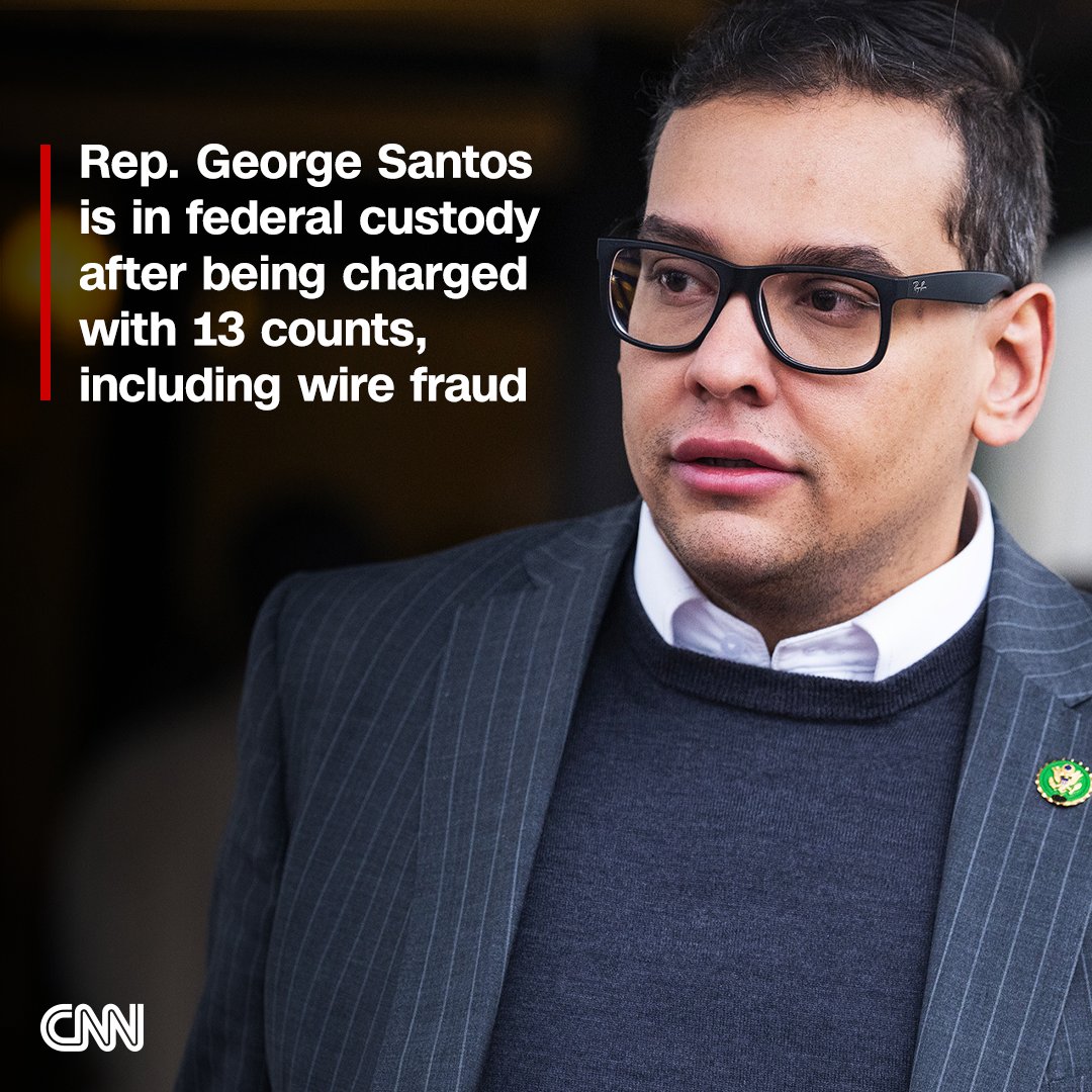 CNN's tweet photo. New York Republican Rep. George Santos is in federal custody facing 13 counts, including wire fraud, money laundering and theft of public funds.

Follow live updates: https://t.co/qx8gbgw6aa https://t.co/KU2tdlOD7a