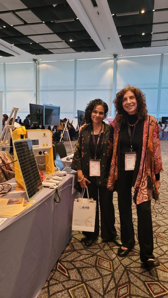 With the amazing maternal health advocate Laura Stachel and her solar suitcase from @wecaresolar at #IMNHC2023 her solar suitcases have lit up more than 8000 maternal health facilities across the African content. @pushcampaignorg