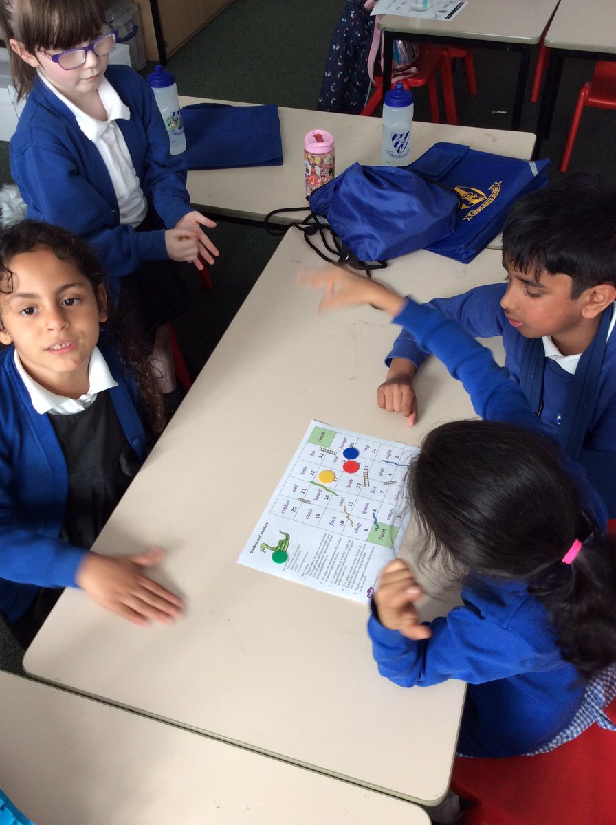 GSPSFrance's tweet photo. Tonight in Phonics Club @GSPSFrance and @GSPSGermany played snakes and ladders with their friends. They had to read and look for special friends and be careful not to get caught by a snake. @GwladysStPrim #GSPSPhonics https://t.co/XpdS0yrhyV