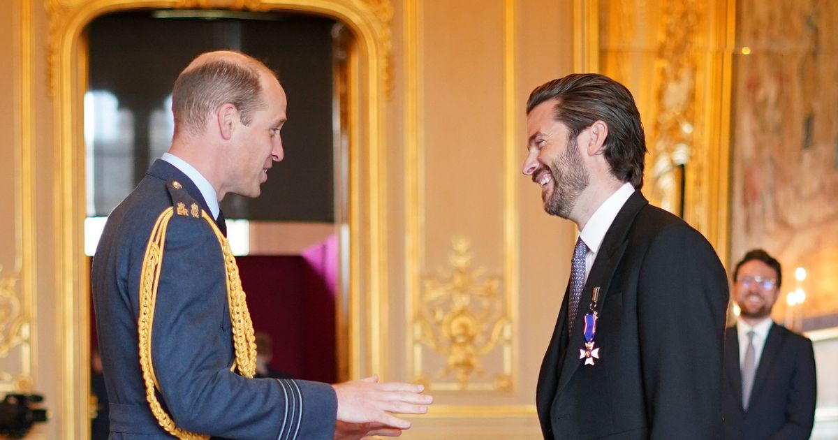 Jason Knauf receives an award from Prince William at Windsor Castle today