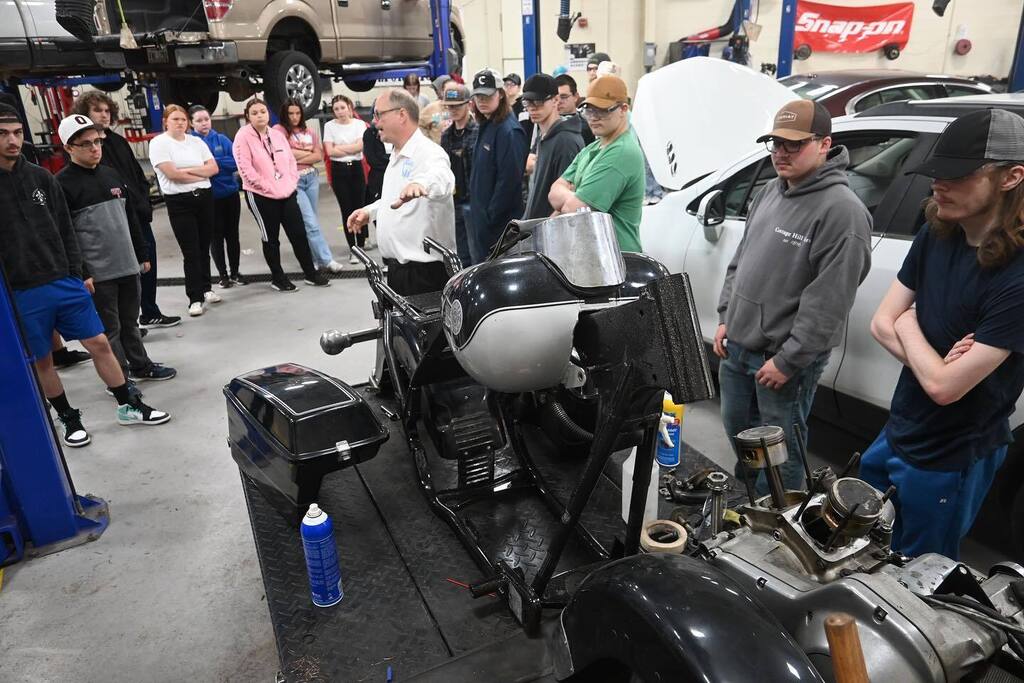 gadmectc's tweet photo. Our auto tech teacher, Mr. Calendine, proposed a project to my students this morning. His students are fixing up a 1988 Harley Road King, and they want us to do vinyl wraps on it as a Mid-East Buffalo tribute bike! A very cool project, hopefully to be co… https://t.co/pw6XyMPUjp https://t.co/anWQ6YQvNg
