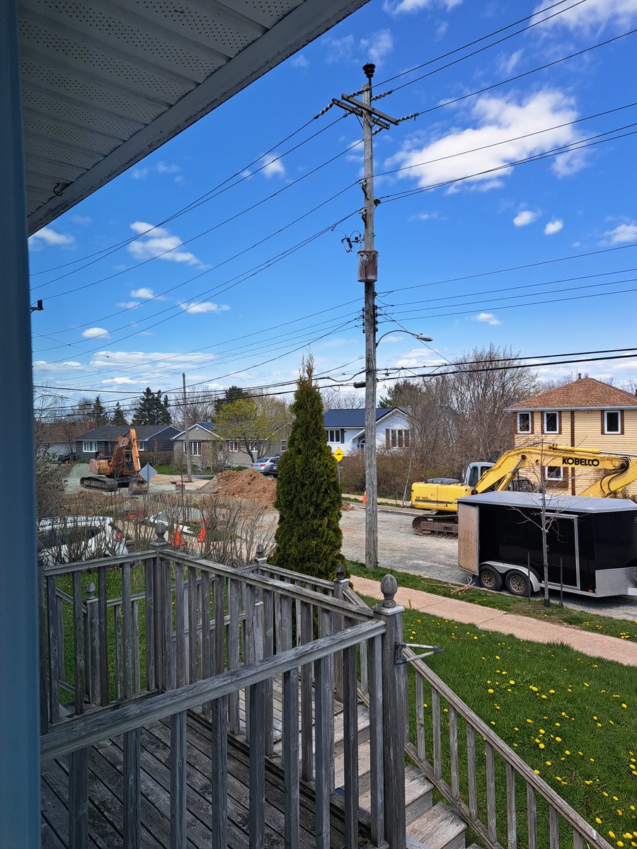 The scene out my front window now would have been more captivating to my then-4 yr old son than any TV show or movie.

I hope somewhere on this street there is a toddler enjoying this chaos.