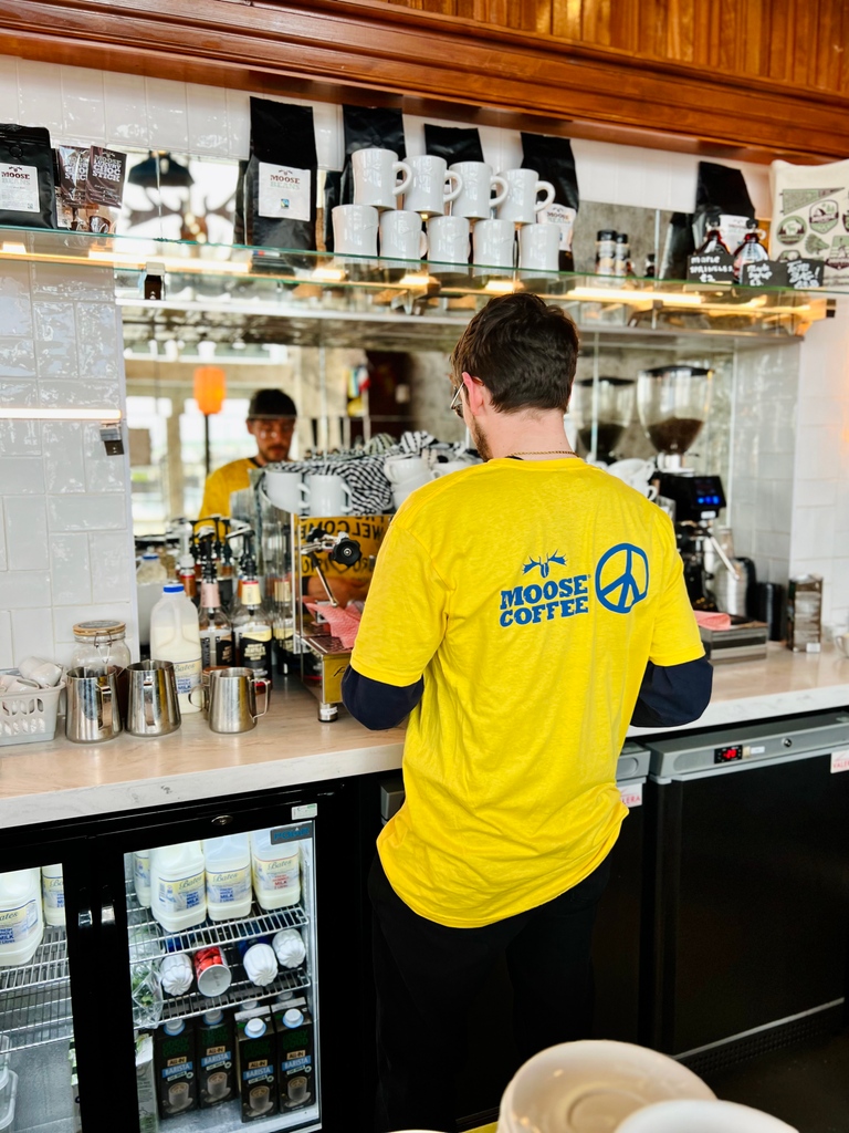 Our lovely GM, Tilly welcoming #Eurovision2023 to Plaza 1821! Now available to buy in-store for just £10 if you want to join the party. 💛 #moosecoffee #liverpool