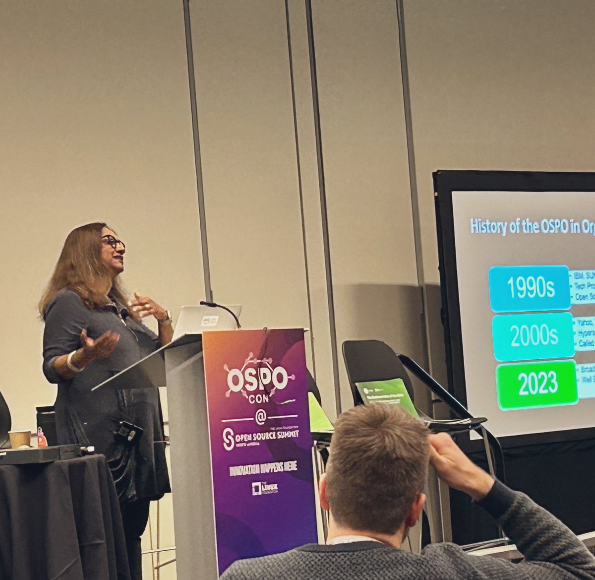 ShillaSaebi's tweet photo. Exciting day at #ossumit in Vancouver! Listening to @nithyaruff talk about the evolving role of OSPOs and the importance of DevX orgs working alongside Security and Policy teams. Lots to learn & keep an eye on. #opensource https://t.co/zTt2rlksy3