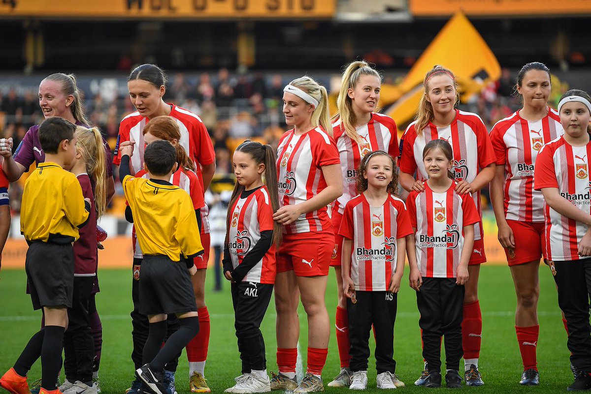 Walking out at the Molineux with the best team & her favourite player @millrogers3 ❤️⚽️