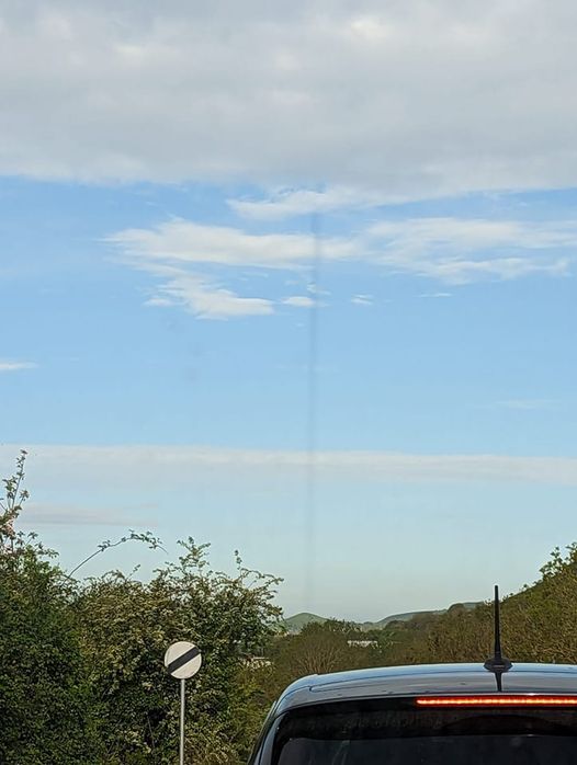 Underbelly2_0's tweet photo. Strange Black Line Photographed In Folkestone, Kent on May 10, 2023 at  8:05am.
The witness stated. "The building at the bottom of the black line is eurotunnel and when I saw it, it lasted about 4 mins." https://t.co/63G703GKJq