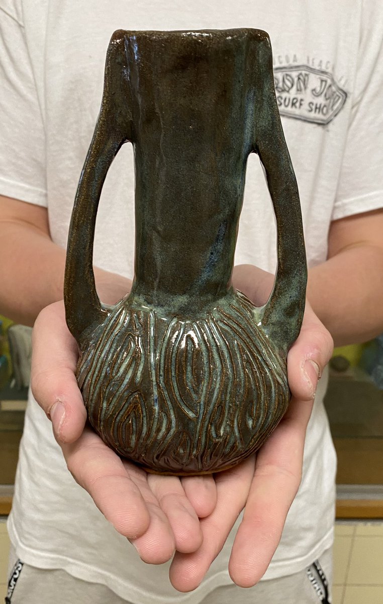 Fresh out of the kiln. Check out this vase by @ops_burke Beginning Pottery student, Izzac C!