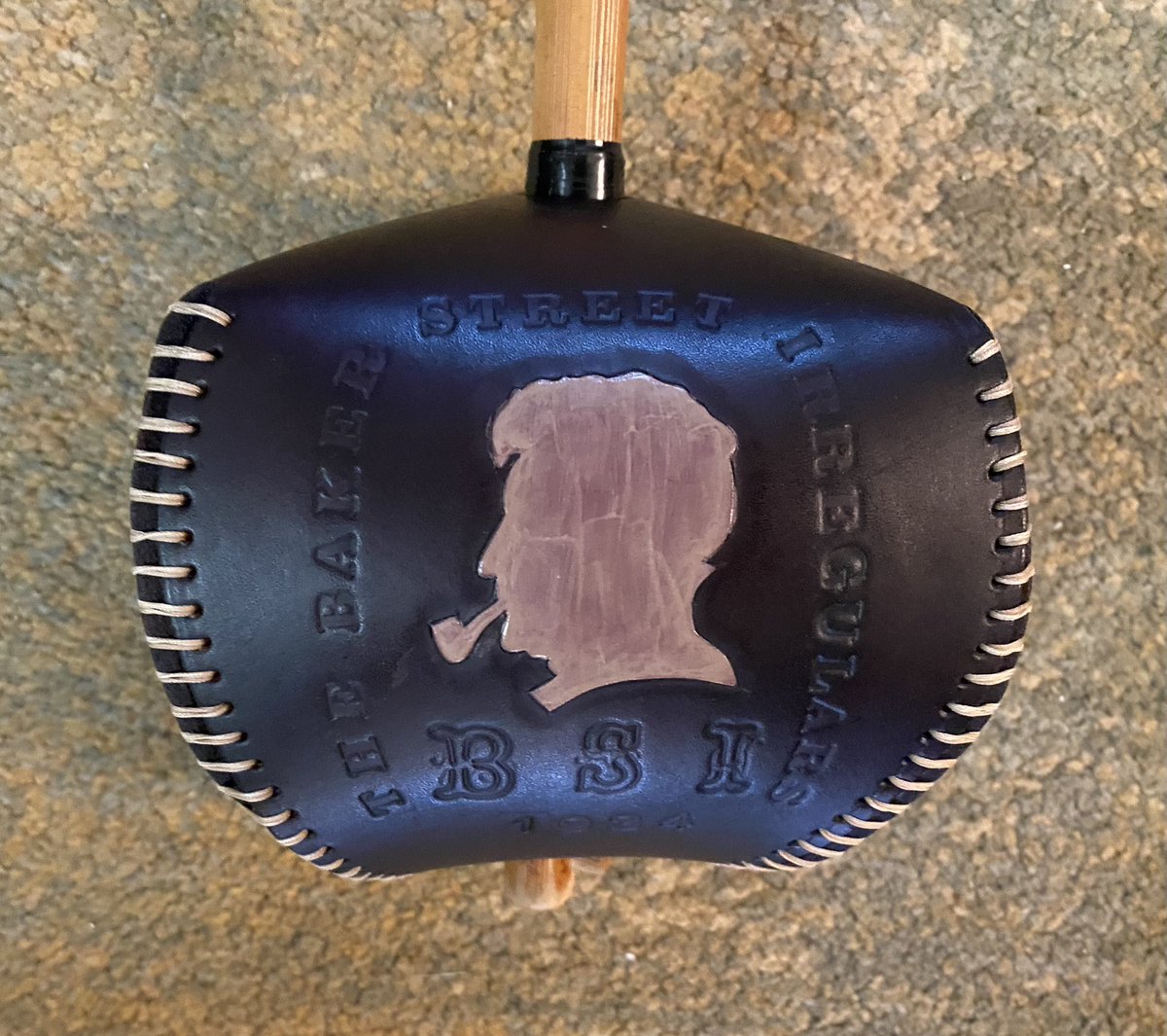 SherlockPhD's tweet image. Commissioned a little present for myself: A wax-hardened leather singlestick basket hilt embossed with the logo of the Baker Street Irregulars. #BSI #Singlestick