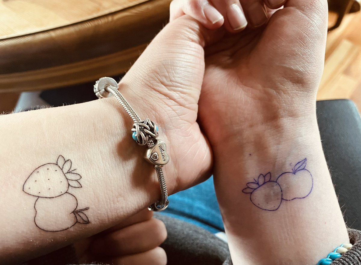Gracie & Laura planned to get little tattoos together but Laura’s so poorly now, it’s just not possible.
Gracie got hers yesterday & came back with a matching stencil for her sister. She’s the strawberry, Laura’s the apple.
#SiblingLoss is a whole other level of heartbreak. 🍓🍎