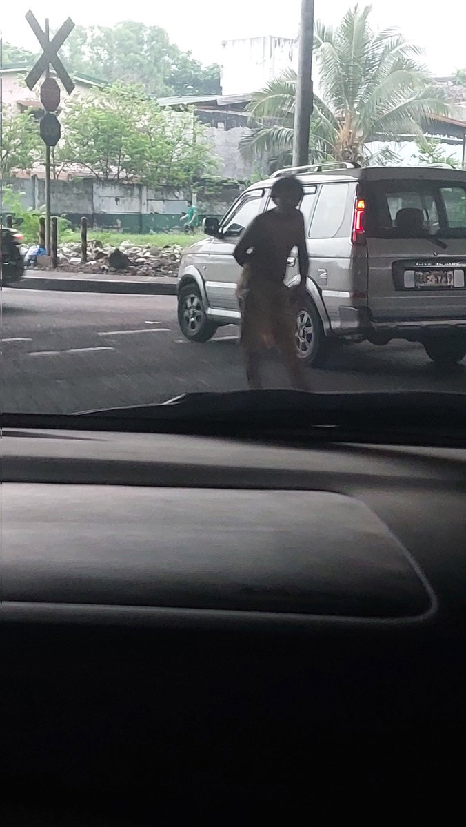 kysjsf's tweet photo. Hi, there is someone in the middle of pablo ocampo cor. osmena highway while big trucks are passing. https://t.co/KnT6CeQ78g https://t.co/GJRPiJhsrT