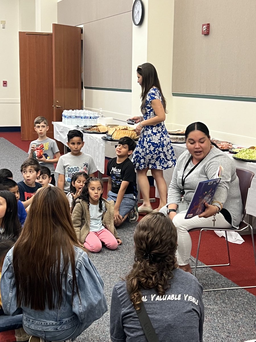 OHarold74's tweet photo. A wonderful EL Family Engagement Night at the Tabb Library! Staff and Families from Seaford ES, Grafton Bethel ES, Grafton MS and Grafton HS. Displays of student work with explanations in various languages. ⁦@YCSD⁩ https://t.co/NXTvjgbELt