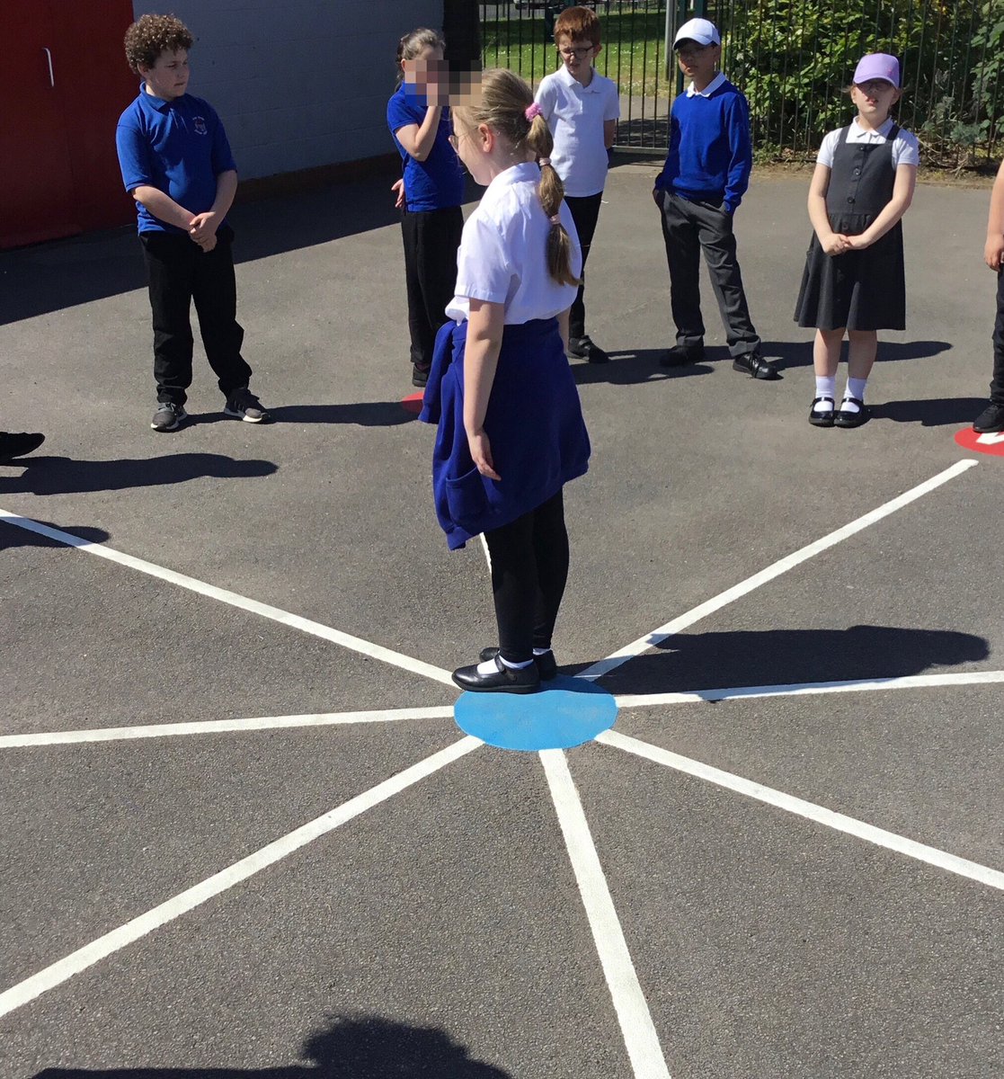 LeysFarm's tweet photo. Class 4W taking advantage of the sun yesterday when recalling turns and angles. They used the playground markings to work on compass points and directions. #LFJSMaths https://t.co/aYVx1b0GlL