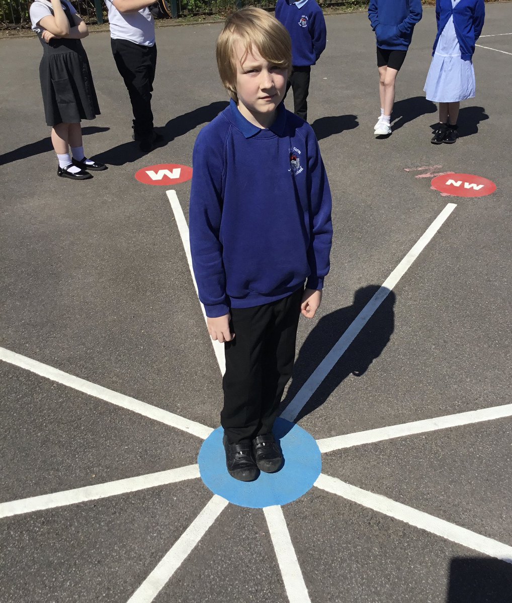 LeysFarm's tweet photo. Class 4W taking advantage of the sun yesterday when recalling turns and angles. They used the playground markings to work on compass points and directions. #LFJSMaths https://t.co/aYVx1b0GlL