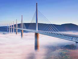 NodesLinks's tweet image. The Millau Viaduct in France, with its elegant and towering design, is taller than the Eiffel Tower! It stands at 343 meters (1,125 feet) and spans the Tarn Valley. Talk about bridging the gap! 🌉🇫🇷 #MillauViaduct #MegaDesign
