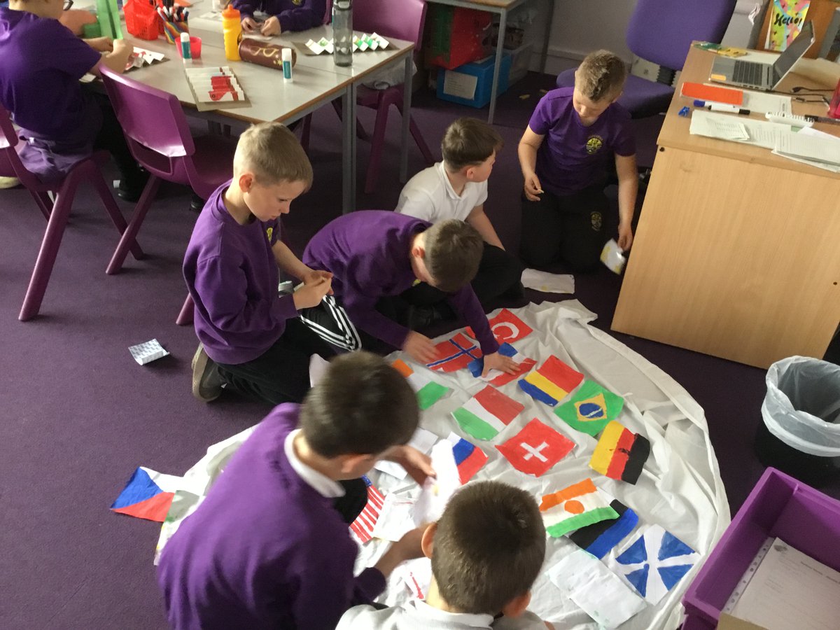 Portyschool's tweet photo. P4/5 preparing for the STEM fashion show this week. We worked as a class to design and create an outfit using recycled materials. Our outfit had to demonstrate Article 7 of the UNCRC. #STEMeducation #STEMweek2023 https://t.co/UczaiE393f