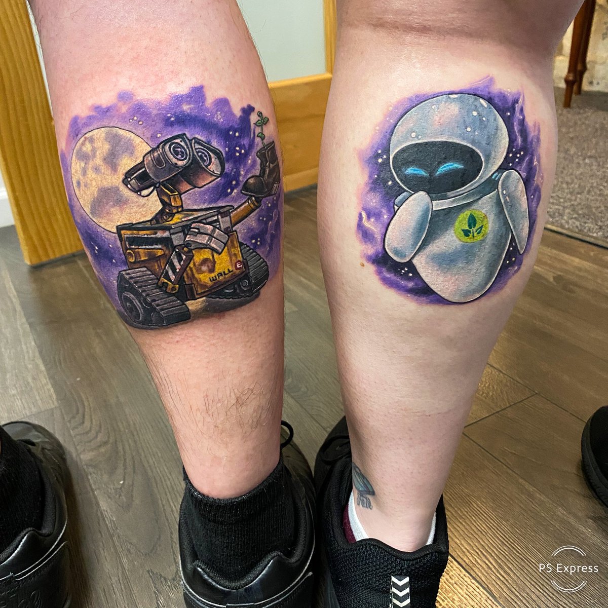 Wall-E and Eve couples tattoos done by Meghan Patrick at our Brooklawn, NJ studio. #12ozstudios #ladytattooers #walle #pixar #couplestattoos